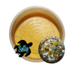 A close-up image of a round silicone mold with a vent clip design, showcasing the texture and a small sample vent clip made from the mold material. The brand logo 'Salty Creations' is visible in the corner.