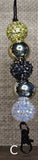 Lanyard with multicolored beads on a brown background