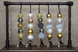 Freshie Hangers on a stand with labeled 'A' to 'E'.