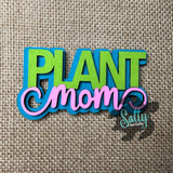 Colorful 'Plant Mom' magnet on a burlap background