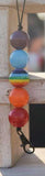 Colorful beaded keychain with a blurred background