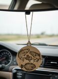 Decorative car hanging with fish design inside a car