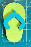 Wooden flip flop magnet on a measuring mat measuring 3.25" x 2"