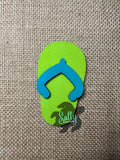 Blue and Lime Green Wooden flip flop magnet on a burlap background.