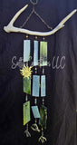 Decorative wind chime with antlers on a dark background, featuring the brand 'Salty Creations LLC'.