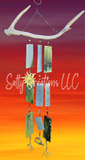 Decorative hanging mobile with antlers and colorful pendants against a sunset background, featuring the brand 'Salty Creations LLC'.
