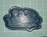 A silicone mold featuring a molded design with the text 'INDIANA' and 'HOOSIERS' on a measureing mat.