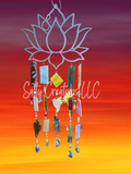 Decorative wind chime with colorful stones against a sunset sky, featuring the brand 'Salty Creations LLC'.