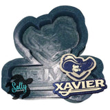 A silicone mold with an embossed design featuring a muskateer. 